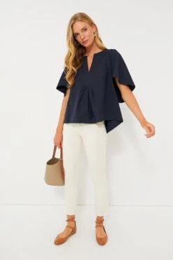Navy Finley Flutter Sleeve Top -Loeffler Cloth Shop a5fuRYE9MsO46jfBWKviaInkEdYMbAW0 1